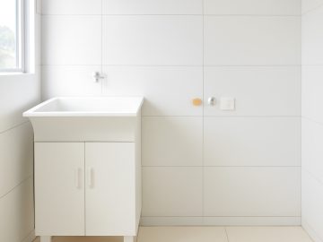 Cozinha Americana e �rea de Servi�o: Layout inteligente que facilita o dia a dia, com lavanderia ventilada e separada da �rea social.